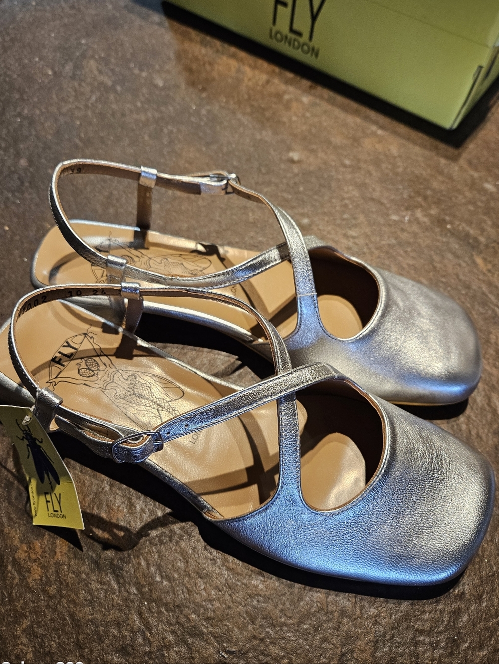 Fly London Metallic Silver Leather T-Strap Mules. New In box. Original $300